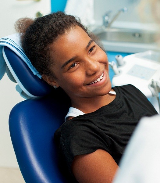 young girl in exam chair