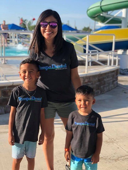 Mother and two sons with Pampa Dental Associates shirts