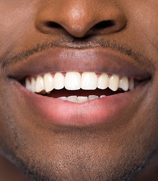 Close shot of mans smile