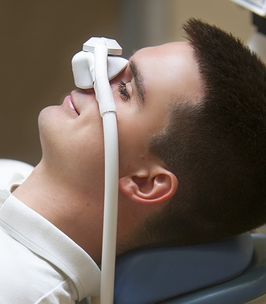 man with nitrous oxide mask on